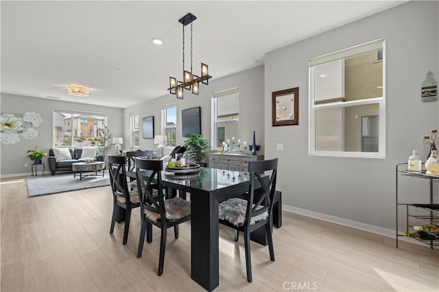 27046 Tanager Ln, Valencia, CA 91381 - dining room featuring a chandelier, light wood-style flooring, and recessed lighting