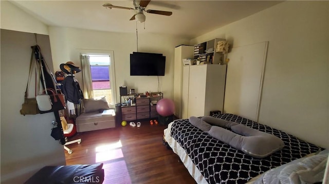 bedroom featuring wood finished floors and ceiling fan