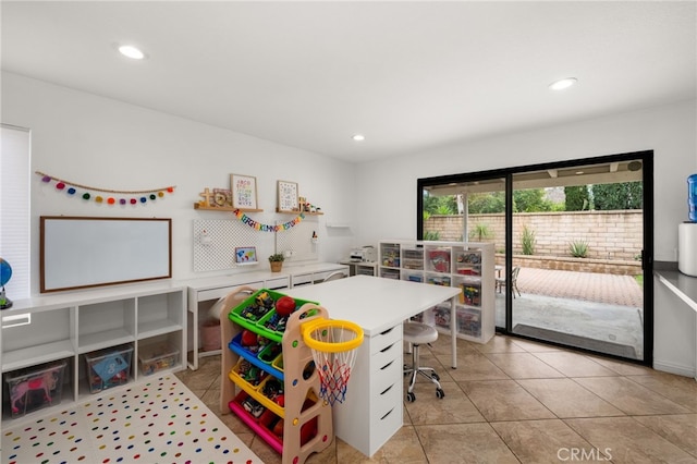 bedroom featuring access to exterior, light tile patterned floors, and recessed lighting