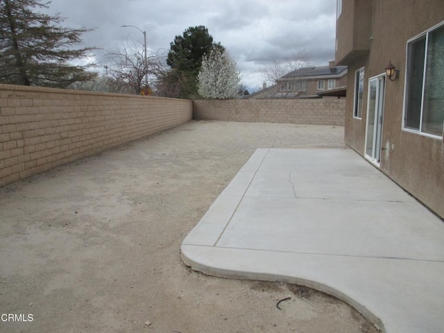 view of patio featuring a fenced backyard