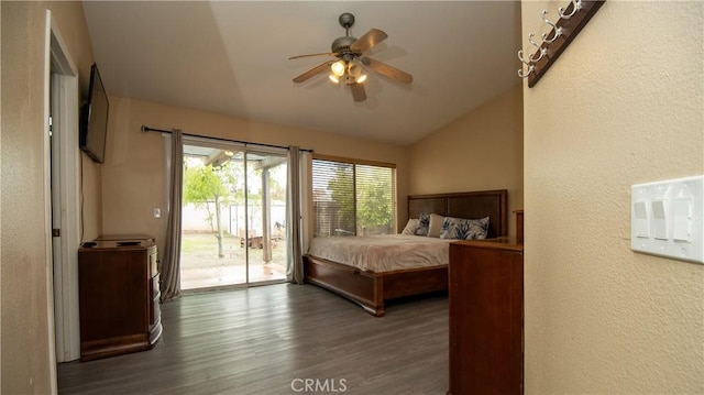 bedroom featuring a ceiling fan, access to outside, wood finished floors, vaulted ceiling, and a textured wall