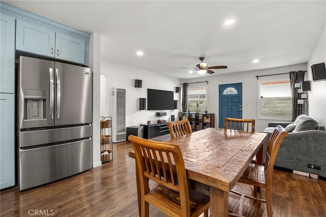 dining area featuring a barn door, recessed lighting, dark wood-style flooring, and ceiling fan