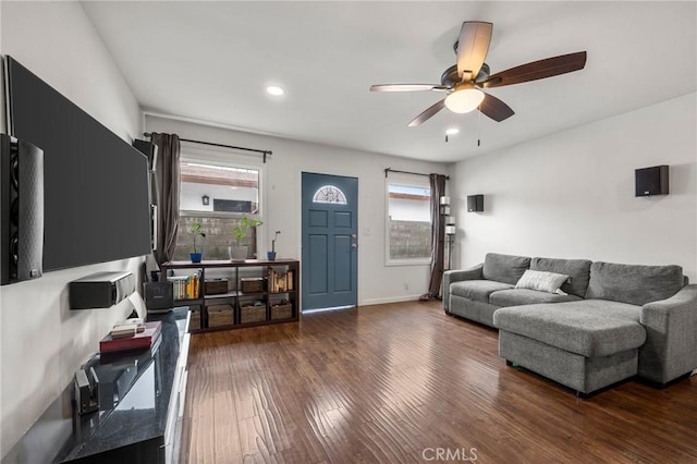 living room featuring recessed lighting, baseboards, dark wood-type flooring, and ceiling fan