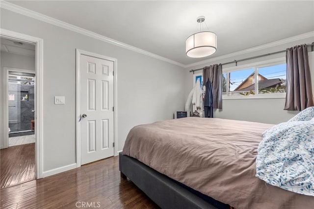 bedroom featuring wood finished floors, baseboards, and ornamental molding