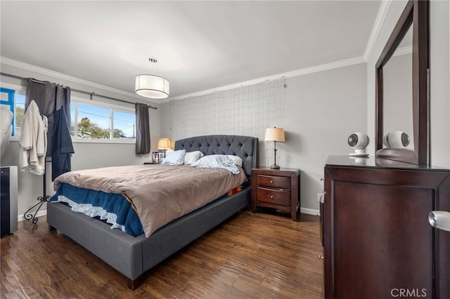 bedroom with wood finished floors, baseboards, and ornamental molding