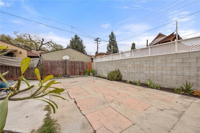 view of patio with a fenced backyard