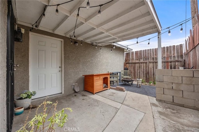 view of patio with fence