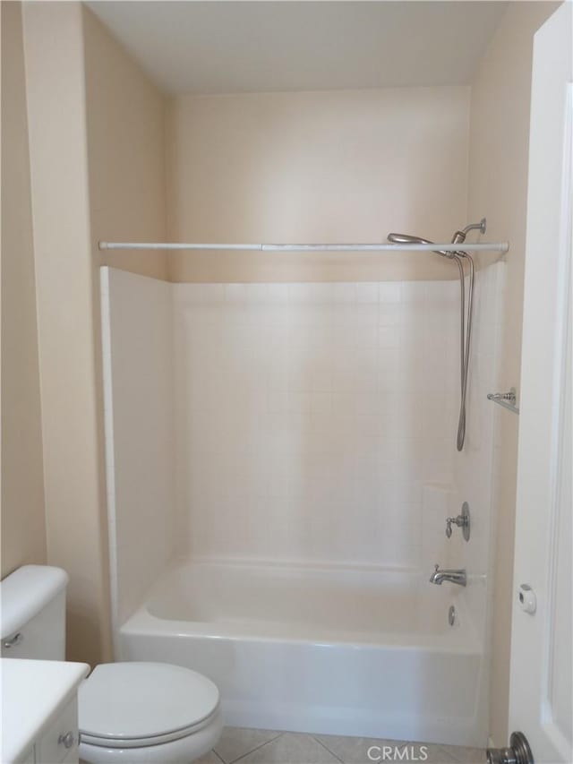 full bath with tile patterned floors, vanity, toilet, and shower / bath combination