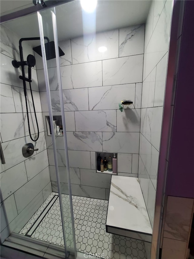 bathroom with a stall shower