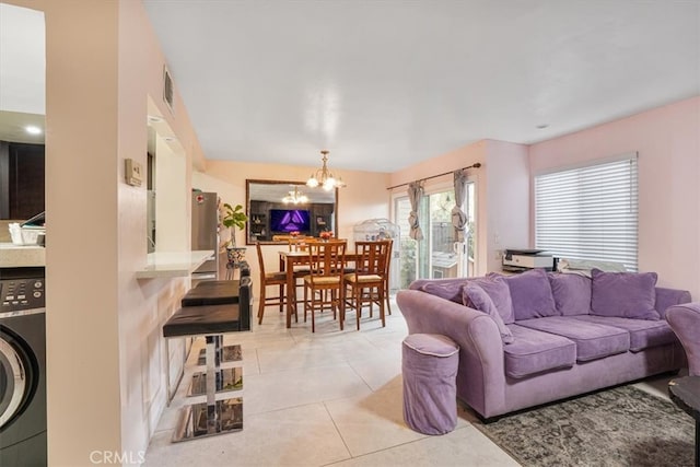 9920 Sepulveda Blvd Unit 1, Mission Hills San Fernando, CA 91345 - living room featuring washer / clothes dryer, a chandelier, and light tile patterned flooring