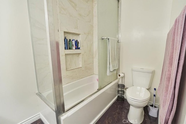 9920 Sepulveda Blvd Unit 1, Mission Hills San Fernando, CA 91345 - full bath featuring baseboards, toilet, and combined bath / shower with glass door