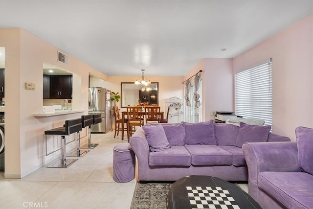 9920 Sepulveda Blvd Unit 1, Mission Hills San Fernando, CA 91345 - living room with a chandelier and light tile patterned floors