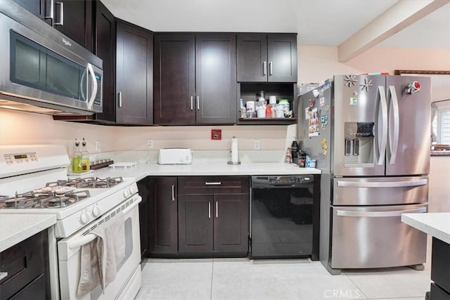 9920 Sepulveda Blvd Unit 1, Mission Hills San Fernando, CA 91345 - kitchen featuring stainless steel appliances, light countertops, light tile patterned floors, and open shelves