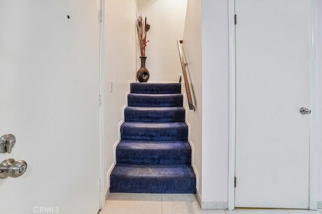 9920 Sepulveda Blvd Unit 1, Mission Hills San Fernando, CA 91345 - stairway with baseboards and tile patterned flooring