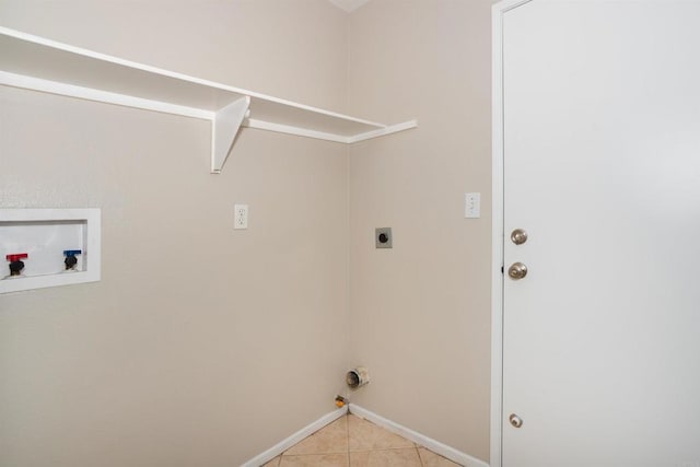 laundry room featuring light tile patterned floors, baseboards, hookup for an electric dryer, laundry area, and washer hookup