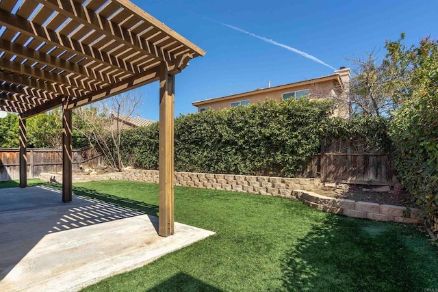 view of yard featuring a patio area, a fenced backyard, and a pergola