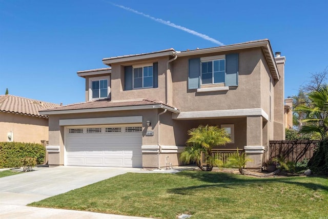 view of front of house featuring fence, a front yard, stucco siding, driveway, and an attached garage