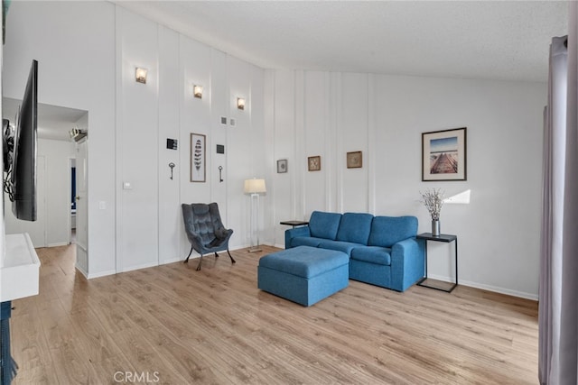 living area with light wood-style floors