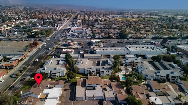 birds eye view of property with a residential view