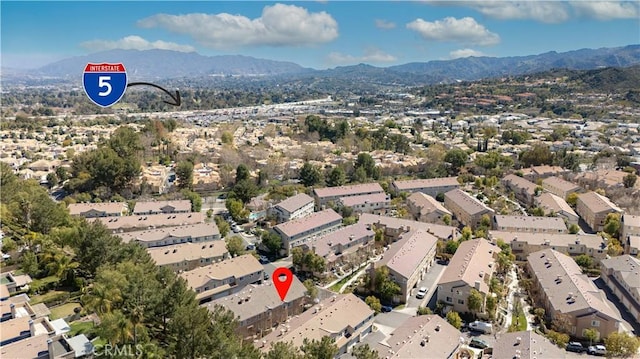 birds eye view of property featuring a residential view and a mountain view