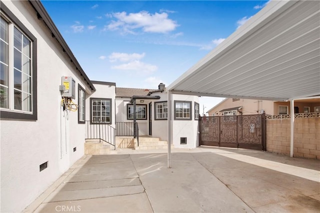 view of patio / terrace featuring fence