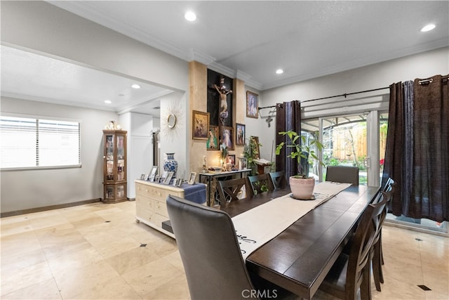 dining area featuring recessed lighting, plenty of natural light, and crown molding