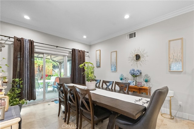 dining room featuring recessed lighting, visible vents, baseboards, and crown molding