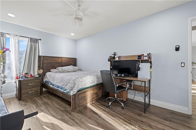 bedroom featuring ceiling fan, baseboards, wood finished floors, and recessed lighting