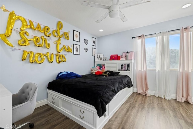 bedroom with recessed lighting, ceiling fan, baseboards, and wood finished floors