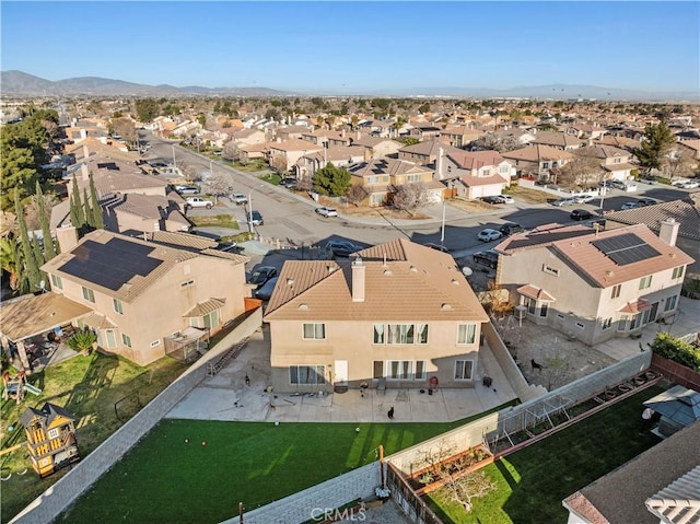 aerial view with a mountain view and a residential view