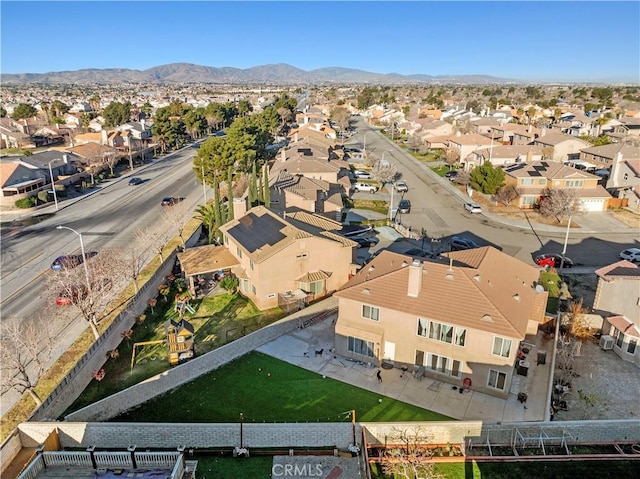 aerial view featuring a mountain view and a residential view