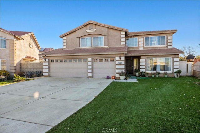 view of front of house with fence, a tile roof, a front yard, driveway, and an attached garage