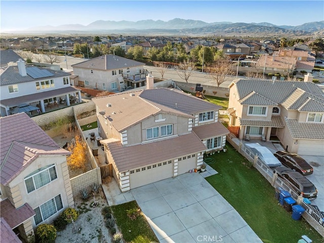 aerial view with a mountain view and a residential view