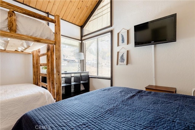 bedroom featuring wooden ceiling and vaulted ceiling