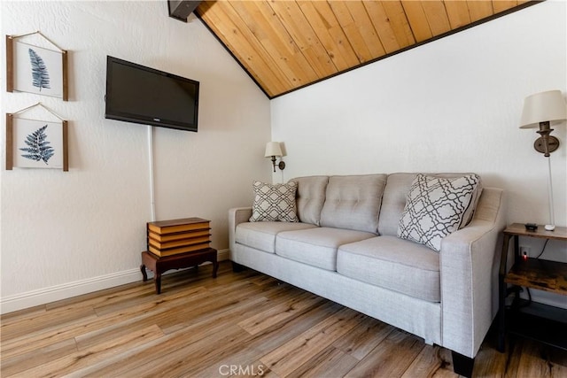 living room with light wood-style flooring, wooden ceiling, lofted ceiling with beams, and baseboards