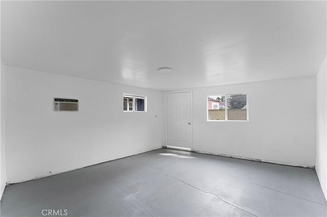 interior space featuring an AC wall unit