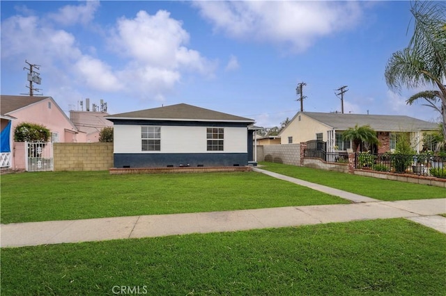 view of front of property with crawl space, a fenced front yard, a front yard, and a gate