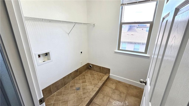 washroom featuring laundry area, hookup for a washing machine, plenty of natural light, and hookup for an electric dryer