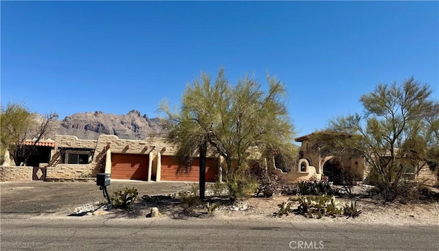 view of front of property featuring an attached garage