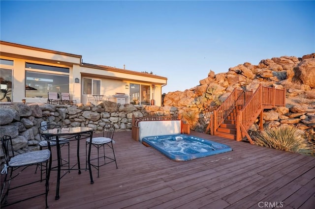 60125 Carrizo Rd, Mountain Center, CA 92561 - deck featuring stairway, outdoor dining area, and hot tub deck surround