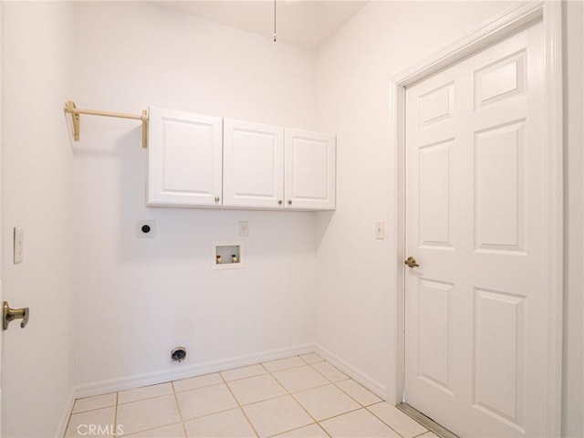 washroom with hookup for a washing machine, cabinet space, baseboards, and hookup for an electric dryer