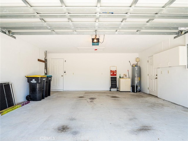 garage featuring a garage door opener and water heater