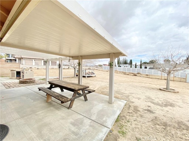 view of patio with fence