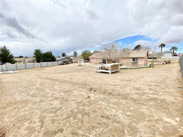 view of yard with fence