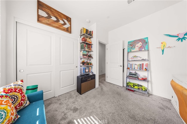 playroom with baseboards and carpet floors