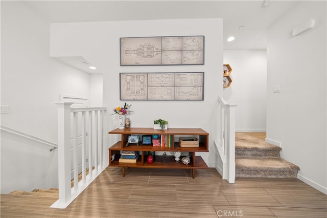 interior space featuring recessed lighting and baseboards