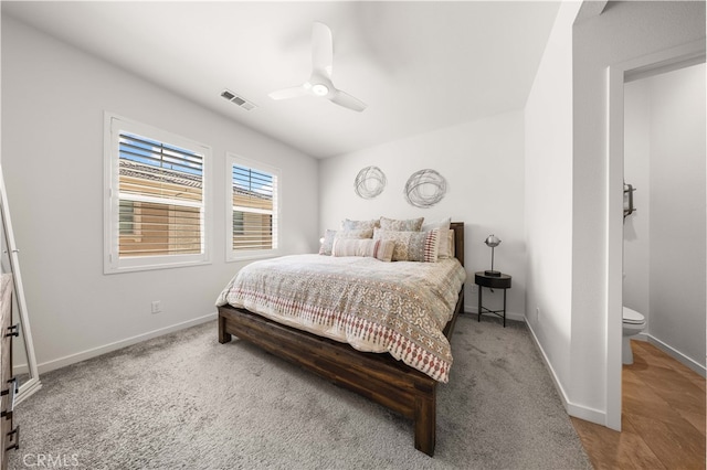 bedroom with visible vents, baseboards, and a ceiling fan