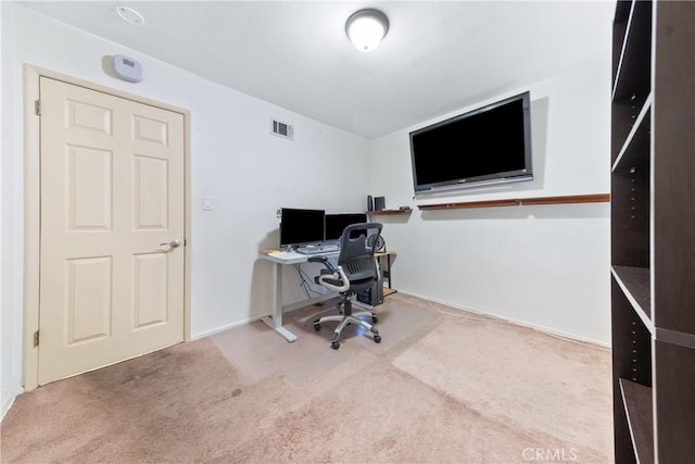 home office featuring carpet and visible vents