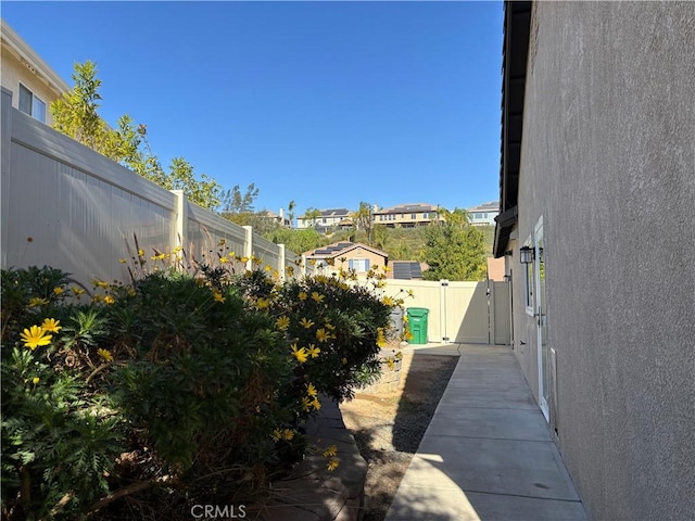 view of yard featuring a gate and fence