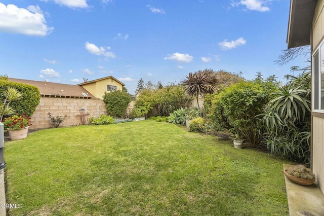 view of yard with fence